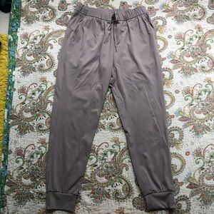 Greyish purple high-waisted joggers with drawstring waist